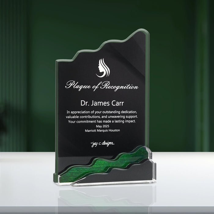 Front view of an acrylic plaque with wavy edge and green accent, showing a customized Plaque of Recognition