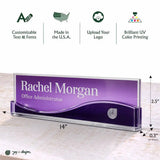 A personalized acrylic desk nameplate with a purple gradient background and white text reading 'Rachel Morgan Office Administrator.' The image includes dimension callouts (14 inches long, 2.