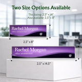 Custom desk nameplates displayed on white pedestals in a blurred office setting, with text showing two size options: 2.5