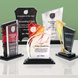 Group photo of Monument Award acrylic trophies in assorted designs and sizes, crafted in Houston, Texas. Perfect for corporate, school, and sports recognition. Customizable with UV print. Free nationwide shipping on orders $35 and above.